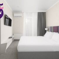Альфа Стандарт с балконом с двуспальной кроватью Отеля ФиоЛето All Inclusive Family Resort
