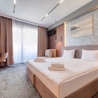 Стандарт с балконом с дополнительным местом СПА-Отеля Грейс Глобал Конгресс & СПА