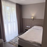 Одноместный улучшенный с диваном и балконом Отеля Магнолия