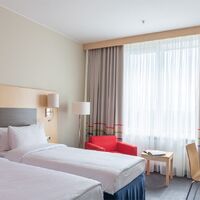 Джуниор Сюит с двумя раздельными кроватями Отеля Cosmos Yaroslavl Hotel