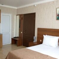 Студио с балконом и кухней Гостевого дома Джанго